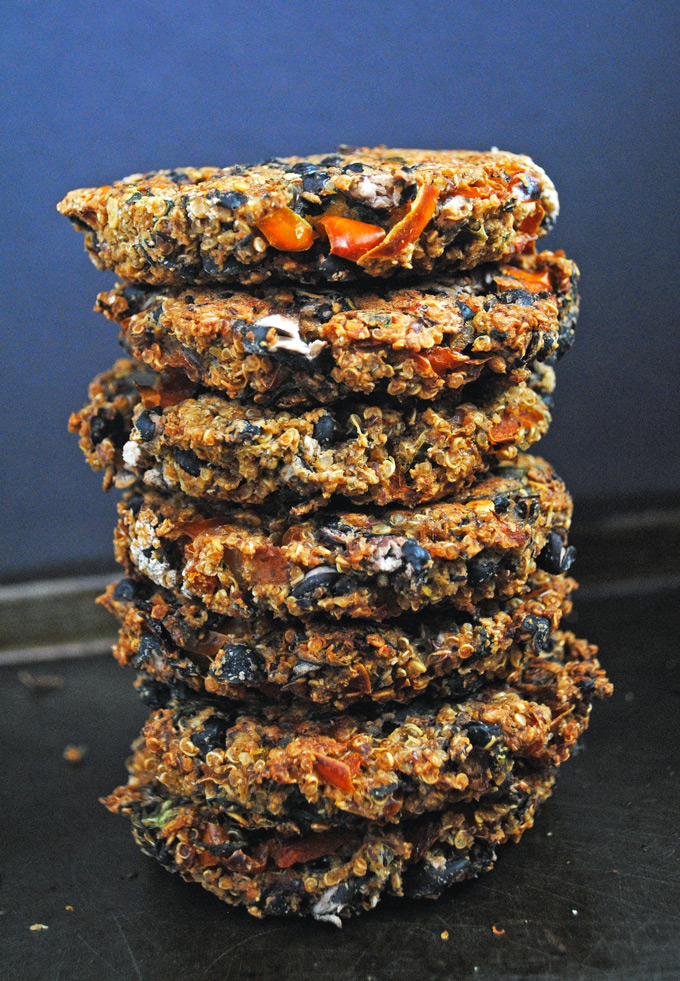 Easy baked black bean quinoa burgers that are vegan & gluten-free, filled with plant protein, and perfect for end-of-the-summer cookouts!