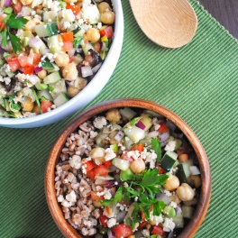 Packed with veggies and fresh Greek flavors, this chickpea salad with tangy vegan almond feta makes a quick, nutritious dinner perfect for lunch leftovers!