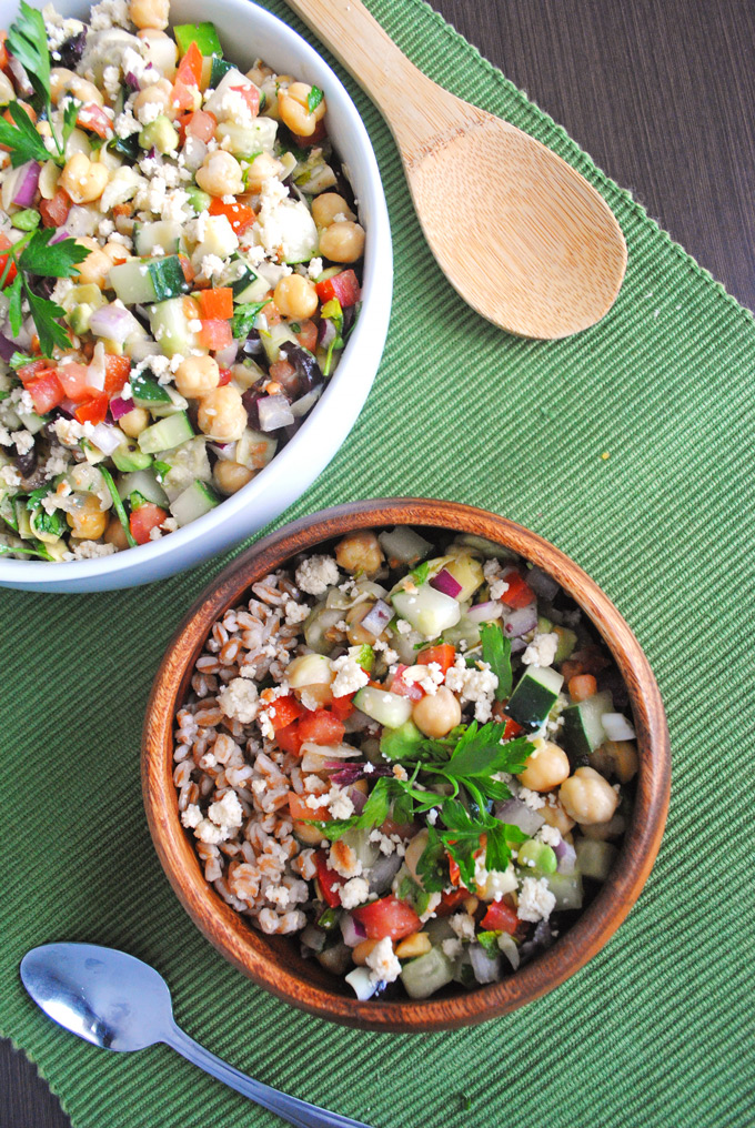 Packed with veggies and fresh Greek flavors, this chickpea salad with tangy vegan almond feta makes a quick, nutritious dinner perfect for lunch leftovers!