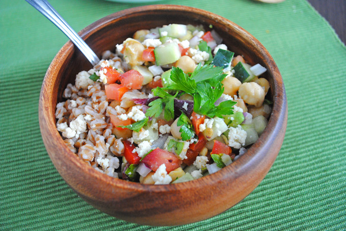 Packed with veggies and fresh Greek flavors, this chickpea salad with tangy vegan almond feta makes a quick, nutritious dinner perfect for lunch leftovers!