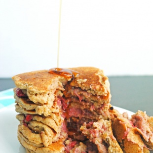 Put a spin on the classic PB&J with these gooey peanut butter and jelly stuffed pancakes! No one will guess they're vegan, whole-wheat, and healthy!