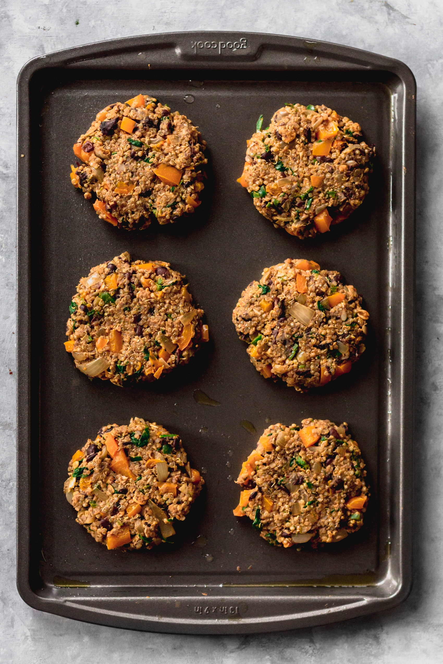 a sheet tray holding 6 veggie burger patties