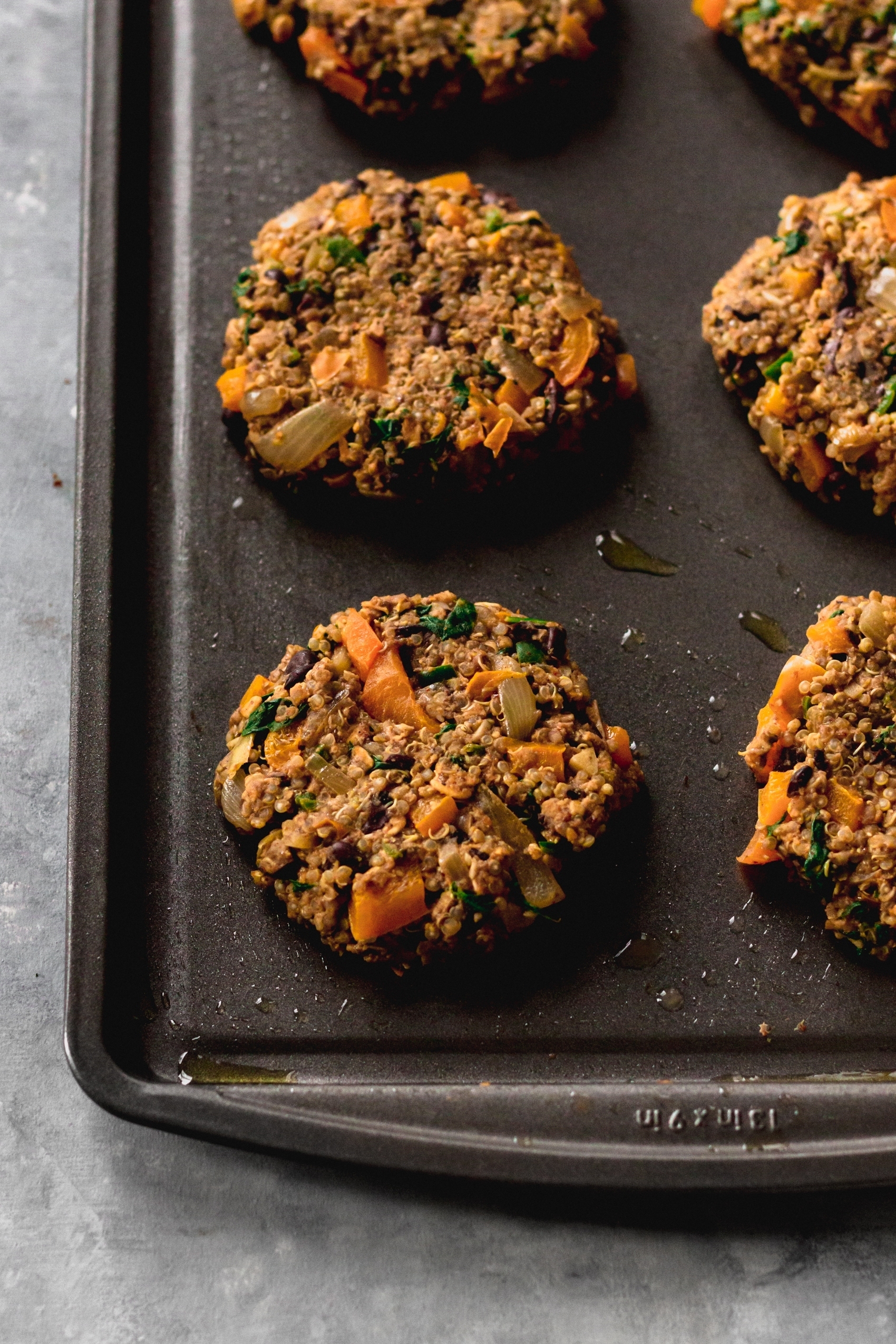 a sheet tray of six veggie burger patties