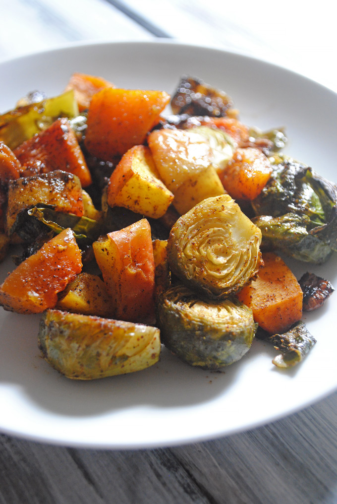 Slightly sweet with a little spice, these Maple Curry Roasted Brussels Sprouts, Butternut Squash and Apples make a delicious side dish for Thanksgiving!