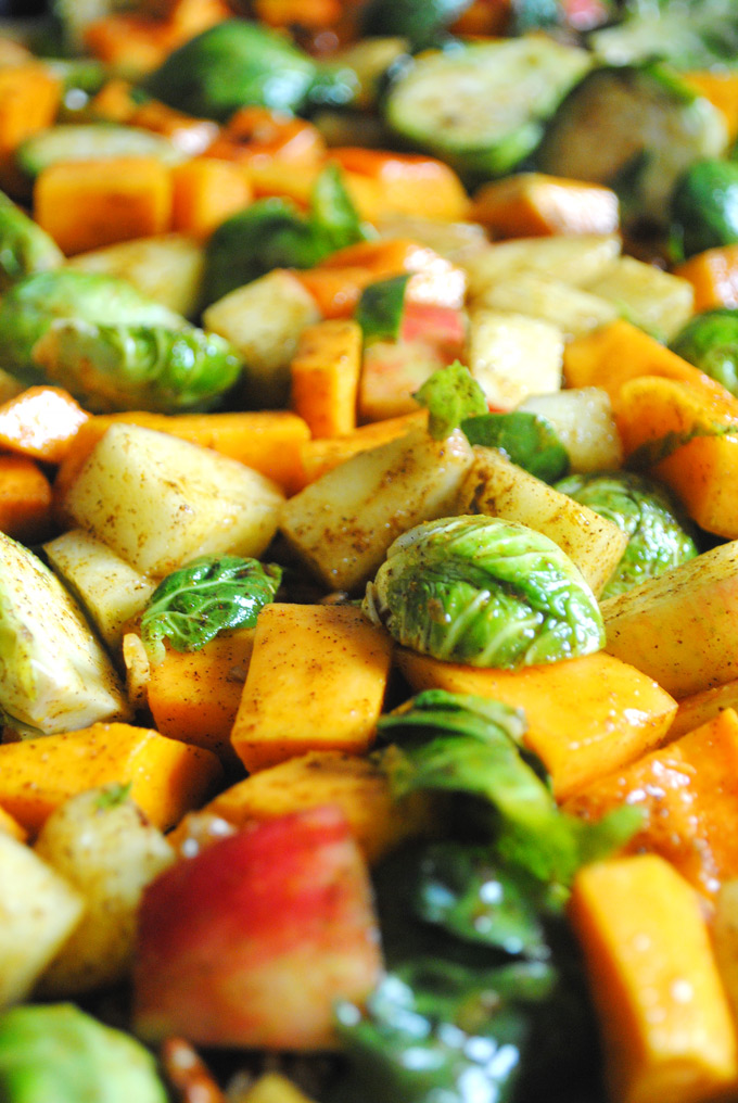 Slightly sweet with a little spice, these Maple Curry Roasted Brussels Sprouts, Butternut Squash and Apples make a delicious side dish for Thanksgiving!