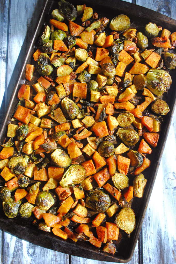 Slightly sweet with a little spice, these Maple Curry Roasted Brussels Sprouts, Butternut Squash and Apples make a delicious side dish for Thanksgiving!