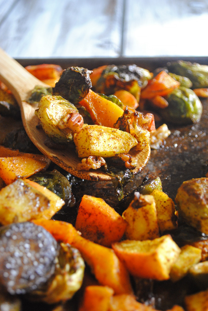 Slightly sweet with a little spice, these Maple Curry Roasted Brussels Sprouts, Butternut Squash and Apples make a delicious side dish for Thanksgiving!