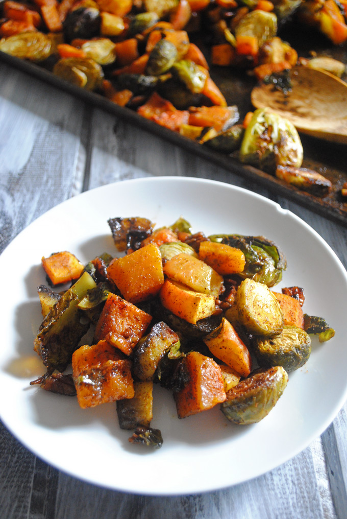 Slightly sweet with a little spice, these Maple Curry Roasted Brussels Sprouts, Butternut Squash and Apples make a delicious side dish for Thanksgiving!