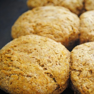 These whole wheat & vegan biscuits are full of delicious pumpkin flavor and warm pumpkin spice! Make them for breakfast or as a side dish for the holidays.