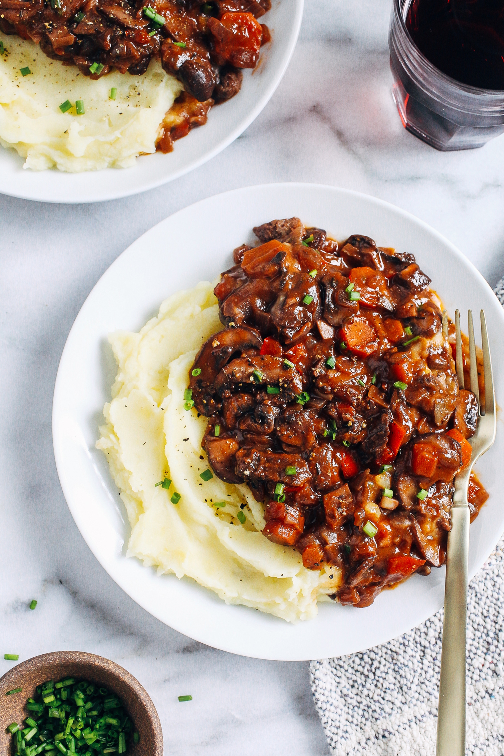 vegan mushroom stew served over mashed potatoes