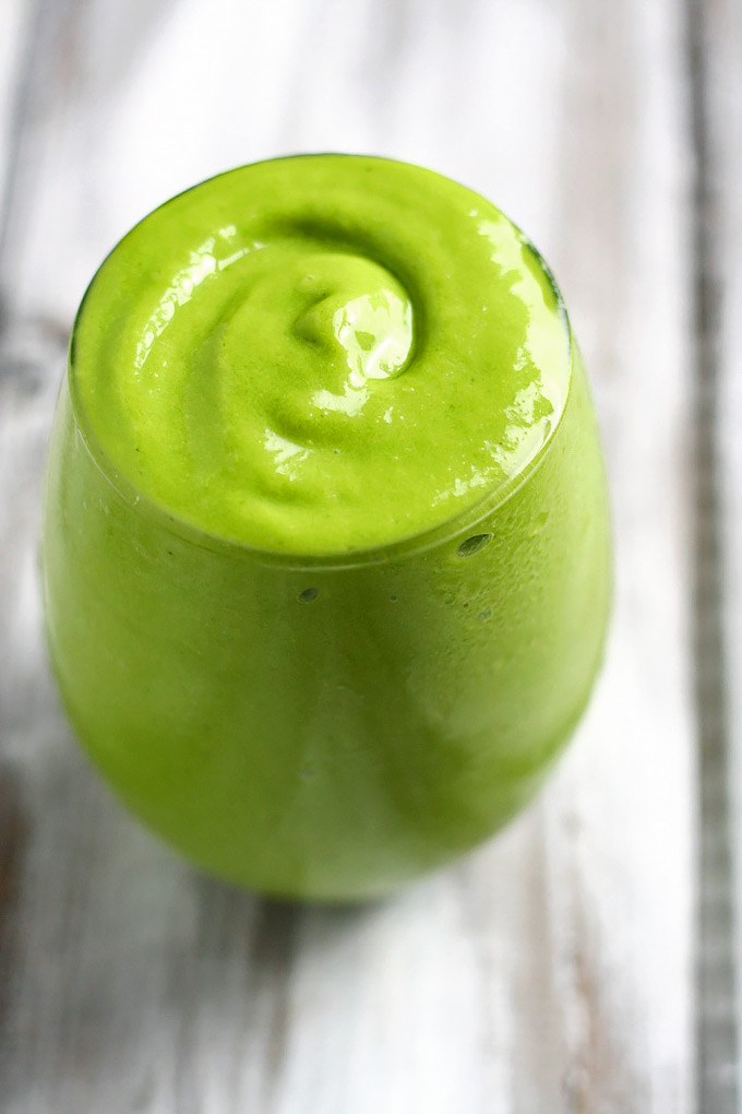 What better way to start eating healthier than with a green smoothie? This Banana Mango Avocado Green Smoothie is simple, creamy, and refreshing!