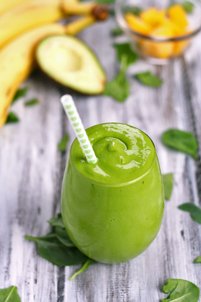 What better way to start eating healthier than with a green smoothie? This Banana Mango Avocado Green Smoothie is simple, creamy, and refreshing!