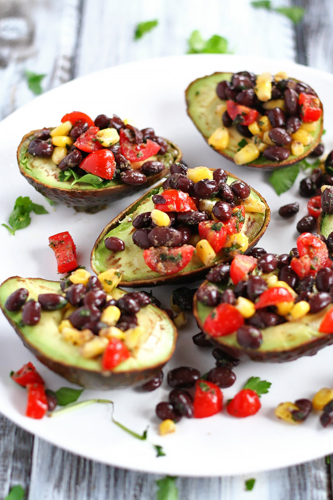 Looking for a healthy party appetizer? This Mexican Stuffed Avocado with Buffalo Tahini Sauce recipe is the perfect one to cook for any gathering.