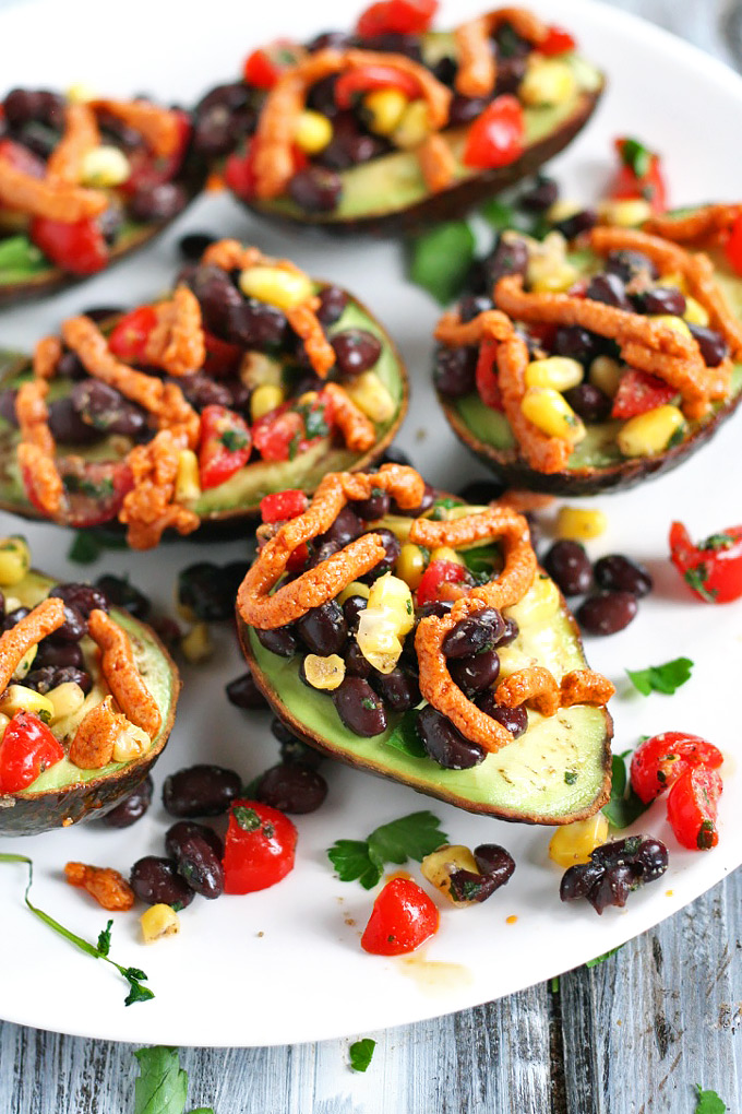 Looking for a healthy party appetizer? This Mexican Stuffed Avocado with Buffalo Tahini Sauce recipe is the perfect one to cook for any gathering.