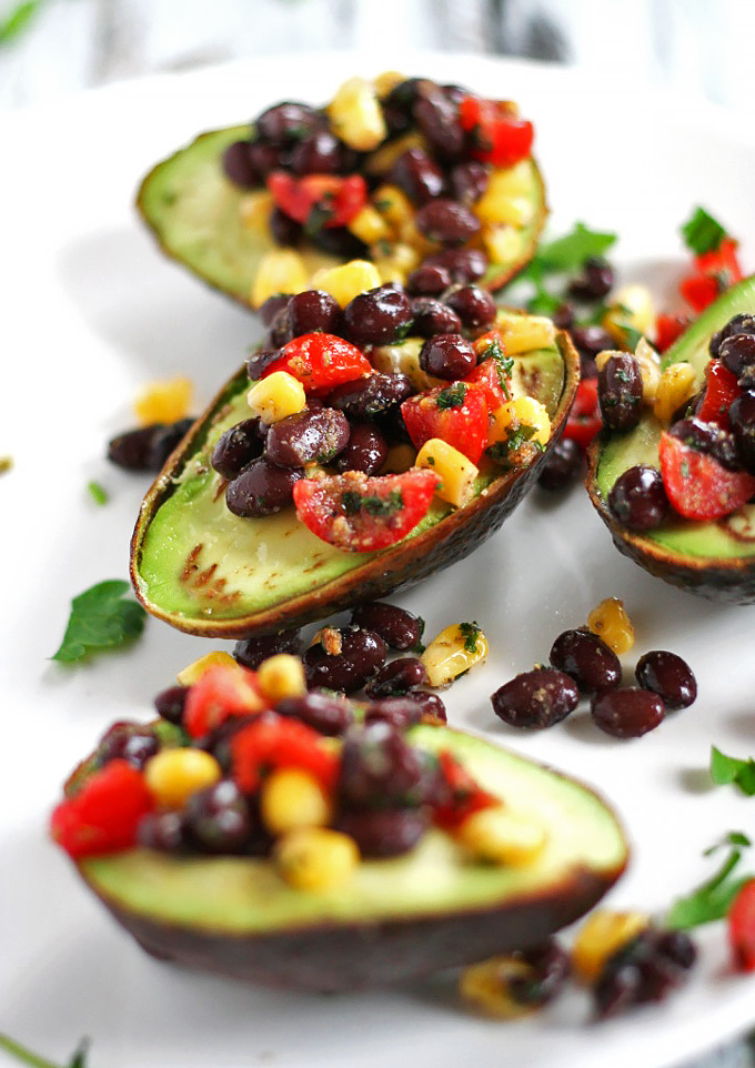 Looking for a healthy party appetizer? This Mexican Stuffed Avocado with Buffalo Tahini Sauce recipe is the perfect one to cook for any gathering.