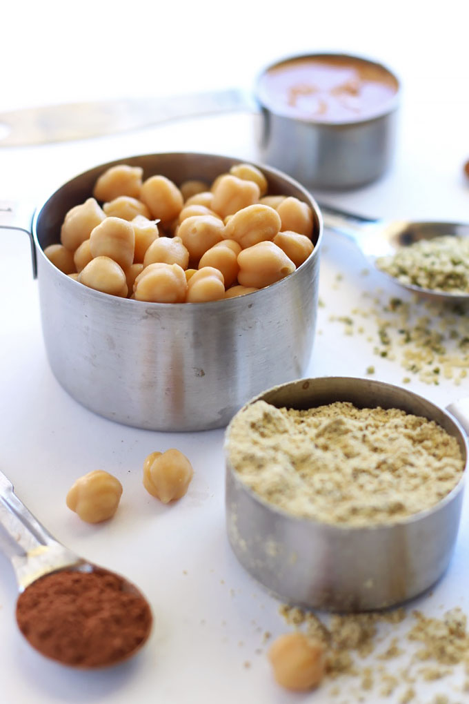 These Chocolate Covered Chickpea Protein Balls taste just like cookie dough, but also pack a ton of protein! They're perfect for a sweet snack on-the-go.