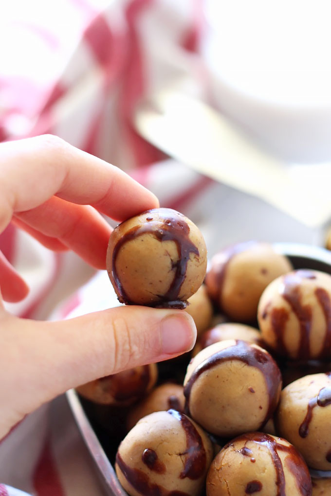 These Chocolate Covered Chickpea Protein Balls taste just like cookie dough, but also pack a ton of protein! They're perfect for a sweet snack on-the-go.
