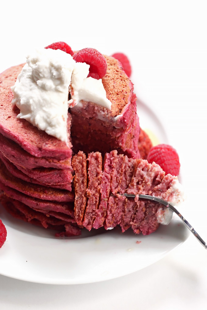 Treat your loved ones on Valentine's day with these tasty Red Velvet Beet Pancakes! The pink color is completely natural, plus they're vegan & gluten-free.