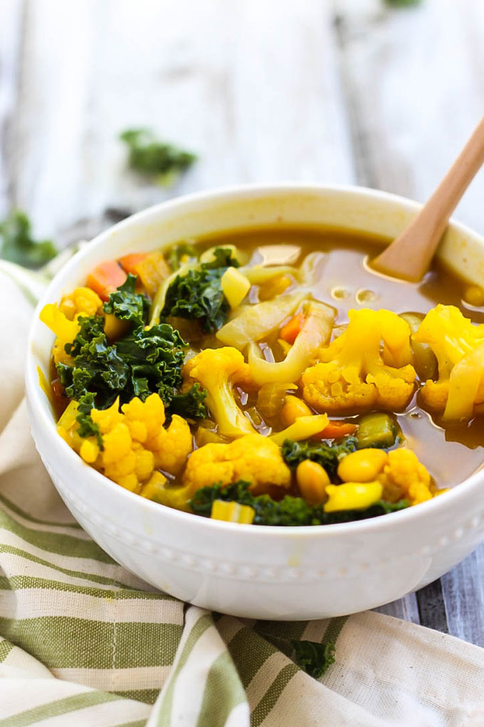 a bowl of golden turmeric veggie soup