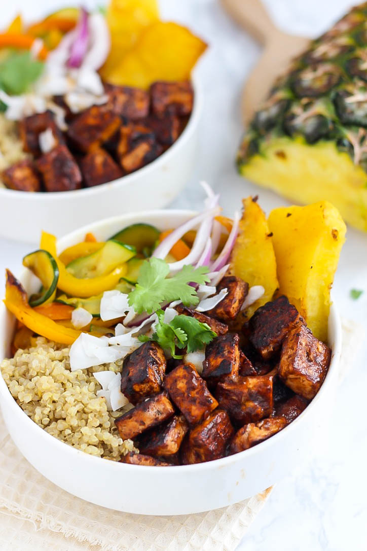 One bite into these Hawaiian BBQ Tofu Bowls will have you dreaming of white sandy beaches. Quinoa and vegetables provide the perfect base for juicy pineapple and tangy tofu!