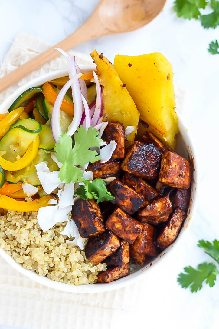 One bite into these Hawaiian BBQ Tofu Bowls will have you dreaming of white sandy beaches. Quinoa and vegetables provide the perfect base for juicy pineapple and tangy tofu!