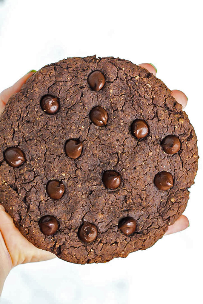 A HUGE chocolate protein cookie that will satisfy your sweet cravings! Healthy enough to have for breakfast, vegan & gluten-free. Plus, it's super tasty!