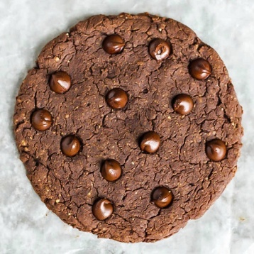 A HUGE chocolate protein cookie that will satisfy your sweet cravings! Healthy enough to have for breakfast, vegan & gluten-free. Plus, it's super tasty!