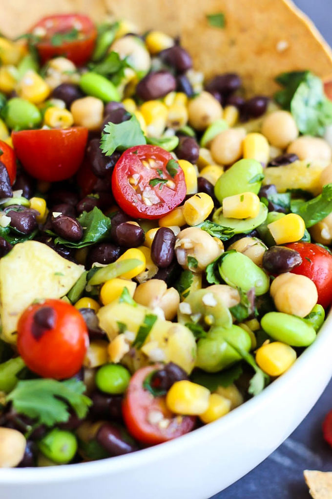 A few simple ingredients & 5 minutes are all you need for this vegan Pineapple Three Bean Salad! Serve with chips to make it the perfect healthy party dish.