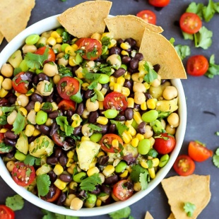 A few simple ingredients & 5 minutes are all you need for this vegan Pineapple Three Bean Salad! Serve with chips to make it the perfect healthy party dish.