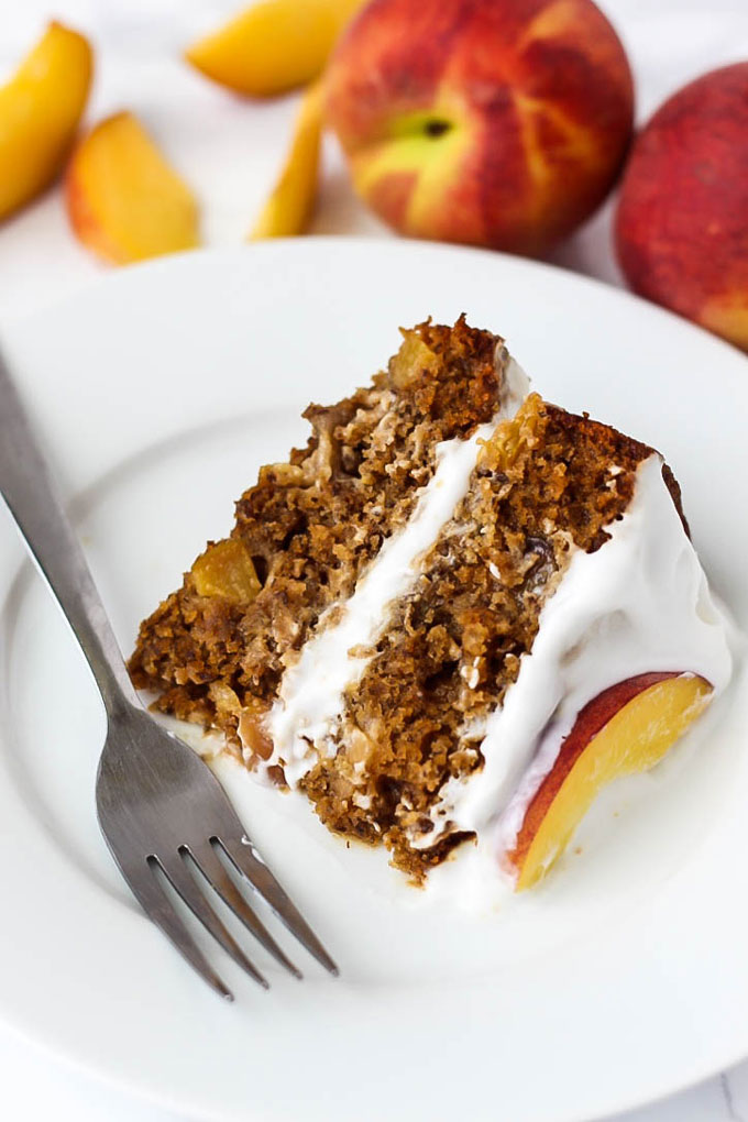 Full of juicy peaches, this Vegan & Gluten-Free Vanilla Peach Cake is a great healthier dessert made with grain-free ingredients you can feel good about.