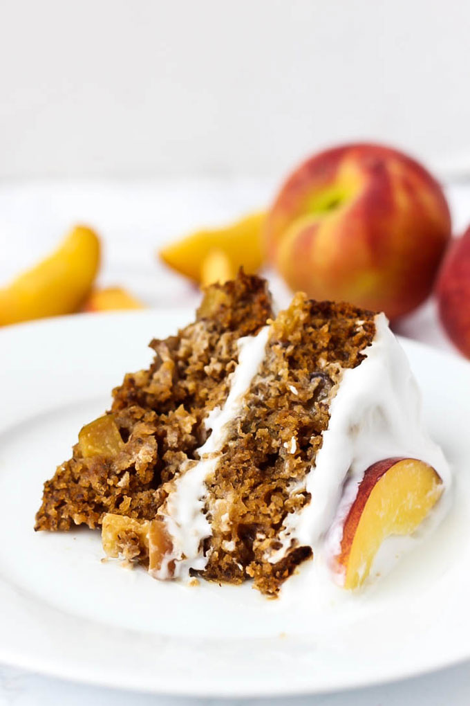 Full of juicy peaches, this Vegan & Gluten-Free Vanilla Peach Cake is a great healthier dessert made with grain-free ingredients you can feel good about.