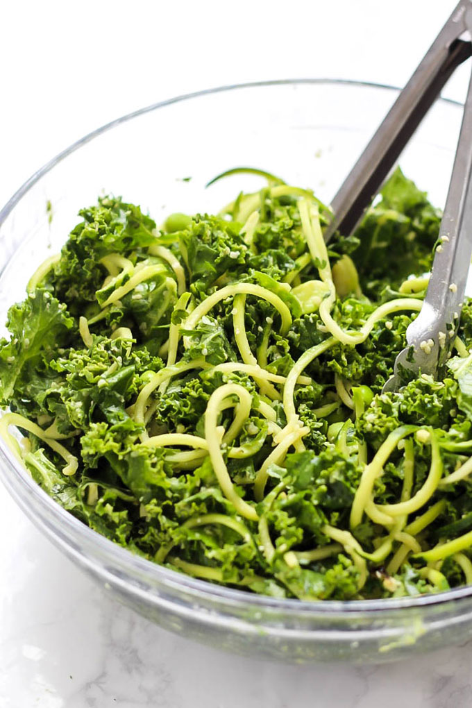 Feed your body all the healthy green things with this vegan Green Goddess Avocado Kale Salad with edamame & zucchini! You'll be glowing from the inside out.