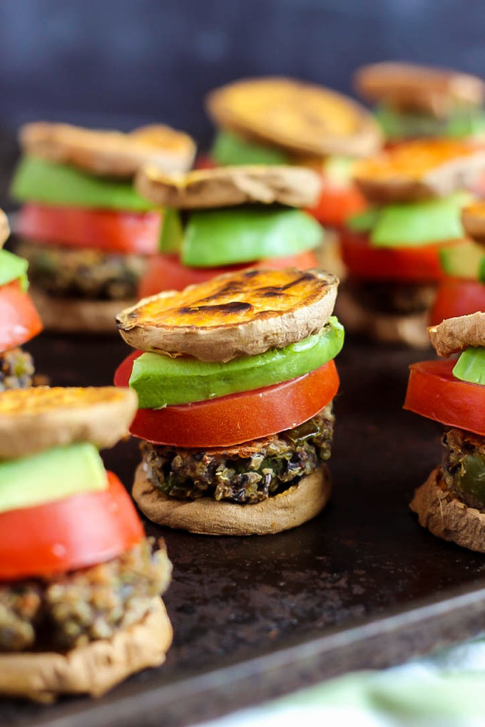 Hearty veggie burgers on sweet potato buns make these Vegan Sweet Potato Sliders a great party appetizer! Have fun with the toppings. Healthy & gluten-free!