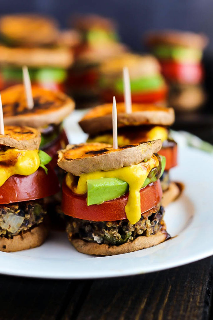Hearty veggie burgers on sweet potato buns make these Vegan Sweet Potato Sliders a great party appetizer! Have fun with the toppings. Healthy & gluten-free!