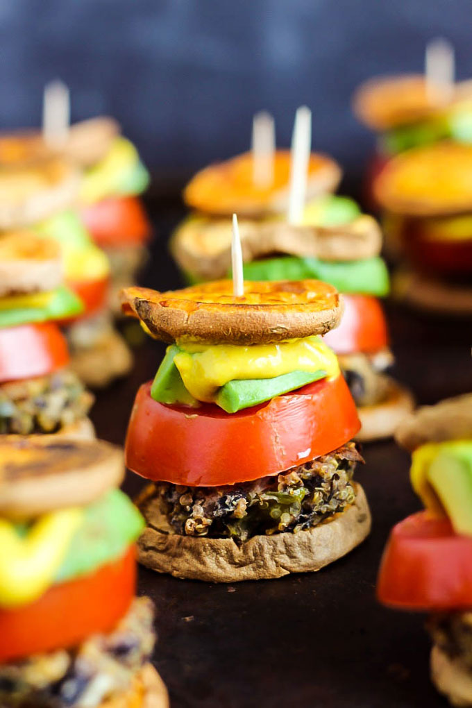 Hearty veggie burgers on sweet potato buns make these Vegan Sweet Potato Sliders a great party appetizer! Have fun with the toppings. Healthy & gluten-free!