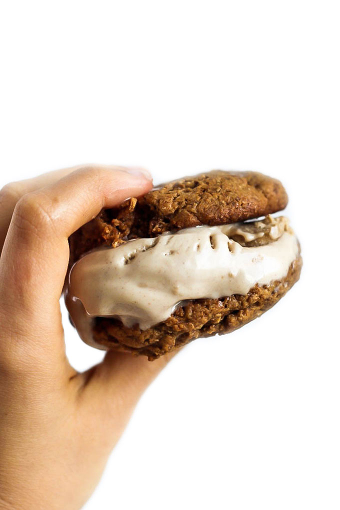 Cookies & ice cream are a match made in heaven in these Almond Butter Snickerdoodle Ice Cream Sandwiches! A decadent vegan & gluten-free treat for any time.