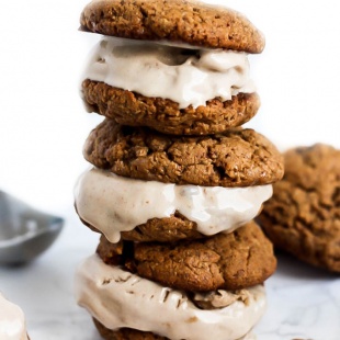 Cookies & ice cream are a match made in heaven in these Almond Butter Snickerdoodle Ice Cream Sandwiches! A decadent vegan & gluten-free treat for any time.