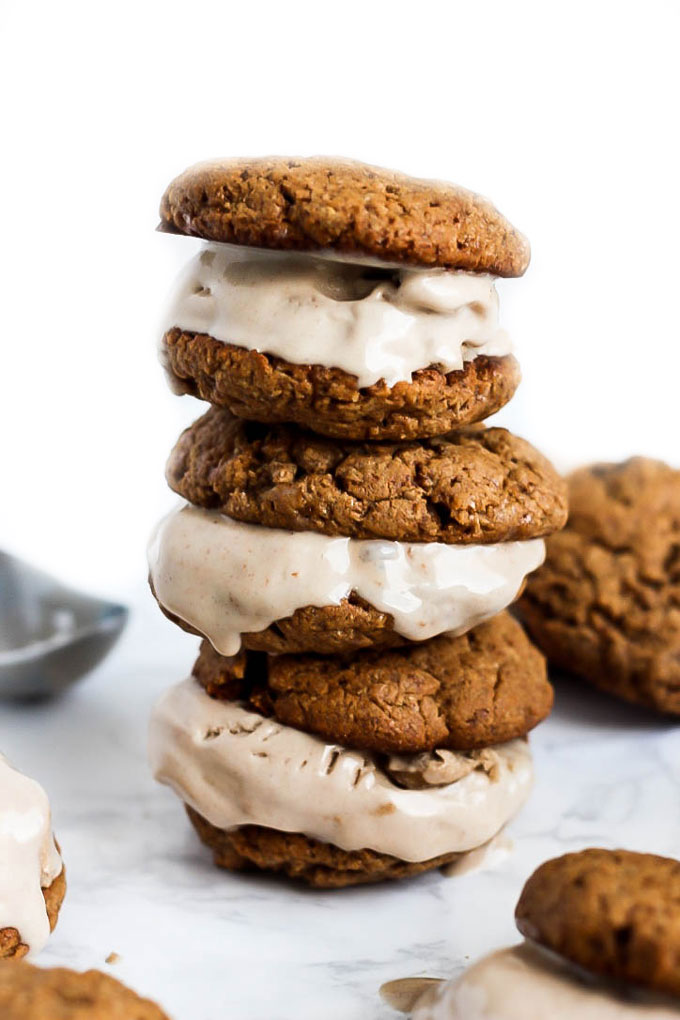 Cookies & ice cream are a match made in heaven in these Almond Butter Snickerdoodle Ice Cream Sandwiches! A decadent vegan & gluten-free treat for any time.