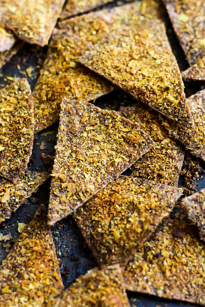 Enjoy the cheesy, crispy snack you love in a healthier way by making these Easy Baked Vegan Doritos! They're a great flavorful snack or party finger food.