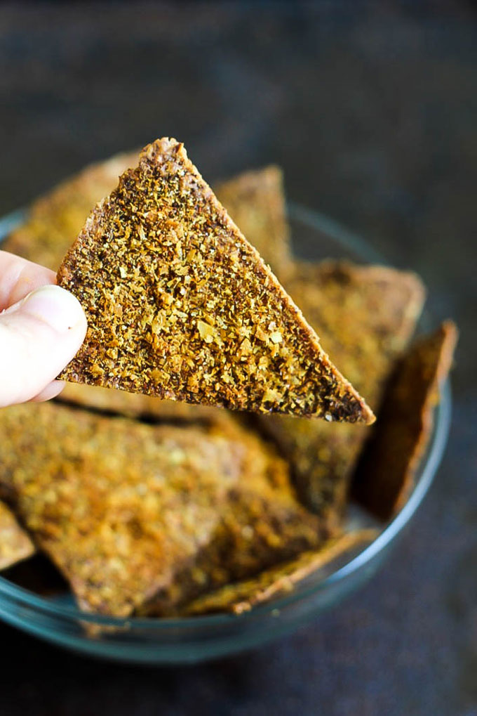 Enjoy the cheesy, crispy snack you love in a healthier way by making these Easy Baked Vegan Doritos! They're a great flavorful snack or party finger food.