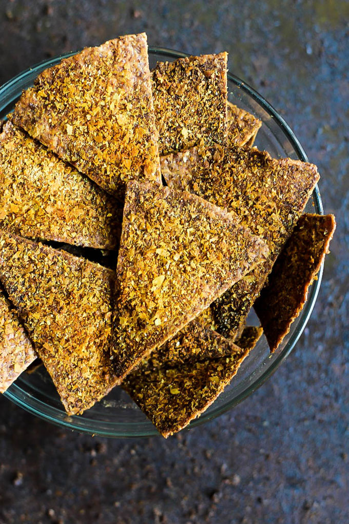 Enjoy the cheesy, crispy snack you love in a healthier way by making these Easy Baked Vegan Doritos! They're a great flavorful snack or party finger food.