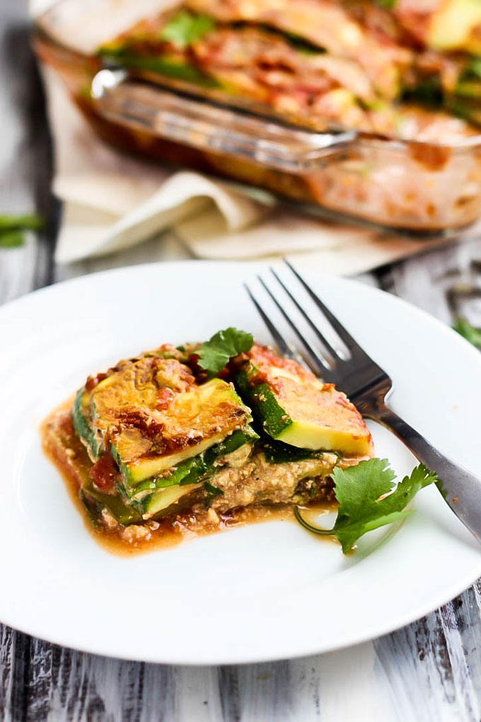 A lighter spin on a classic comfort food, this Vegan Zucchini Lasagna is filling & packed with vegetables. The tofu ricotta tastes just like the real stuff!