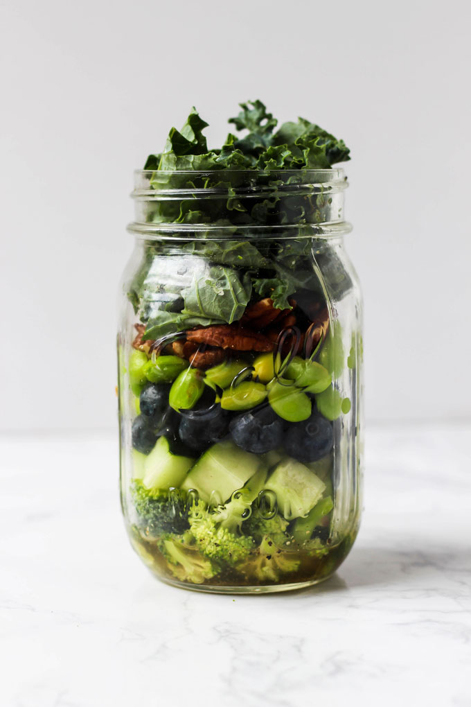 Pack one of these 5 vegan mason jar salad recipes for a healthy lunch on-the-go! They're easy to assemble ahead of time & full of nutritious ingredients.