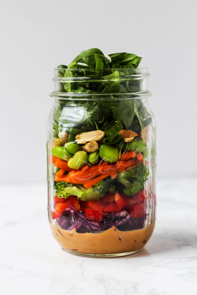 Pack one of these 5 vegan mason jar salad recipes for a healthy lunch on-the-go! They're easy to assemble ahead of time & full of nutritious ingredients.