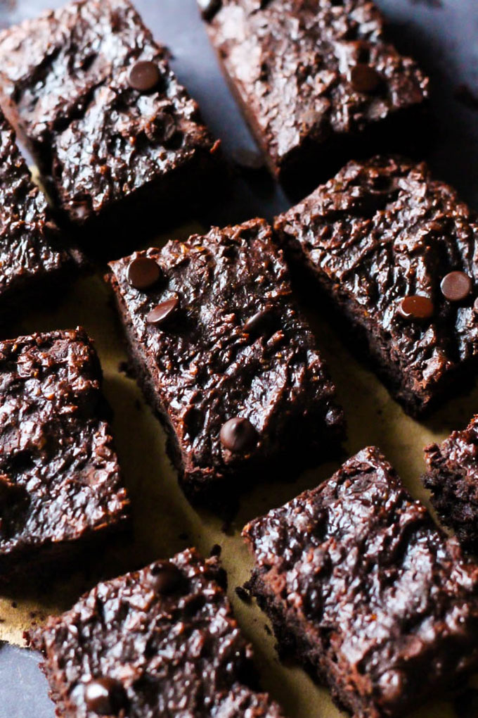 These Chocolate Chip Almond Butter Brownies taste like a decadent dessert, but they're also vegan, gluten-free & date-sweetened! Rich, fudgy & satisfying.