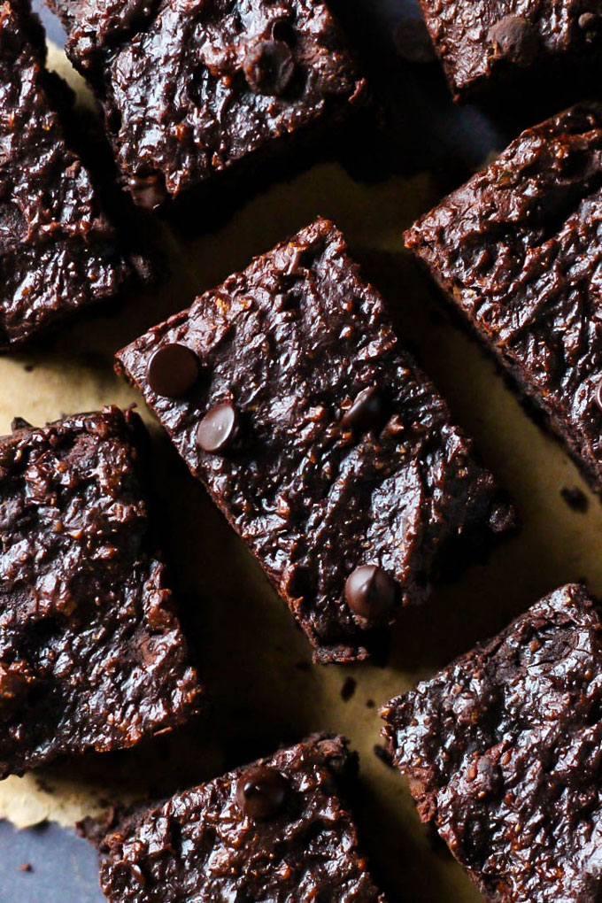 These Chocolate Chip Almond Butter Brownies taste like a decadent dessert, but they're also vegan, gluten-free & date-sweetened! Rich, fudgy & satisfying.