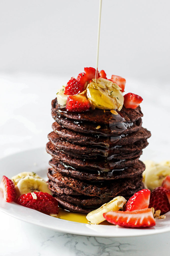 These easy Chocolate Banana Oatmeal Pancakes are made in the blender from wholesome ingredients! A healthy way to curb your morning sweet tooth. Vegan & GF!