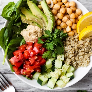 Full of greens and beans, this Greek Quinoa Buddha Bowl is the ultimate healthy lunch or dinner. It's ready in 20 minutes and packed with fresh flavors!