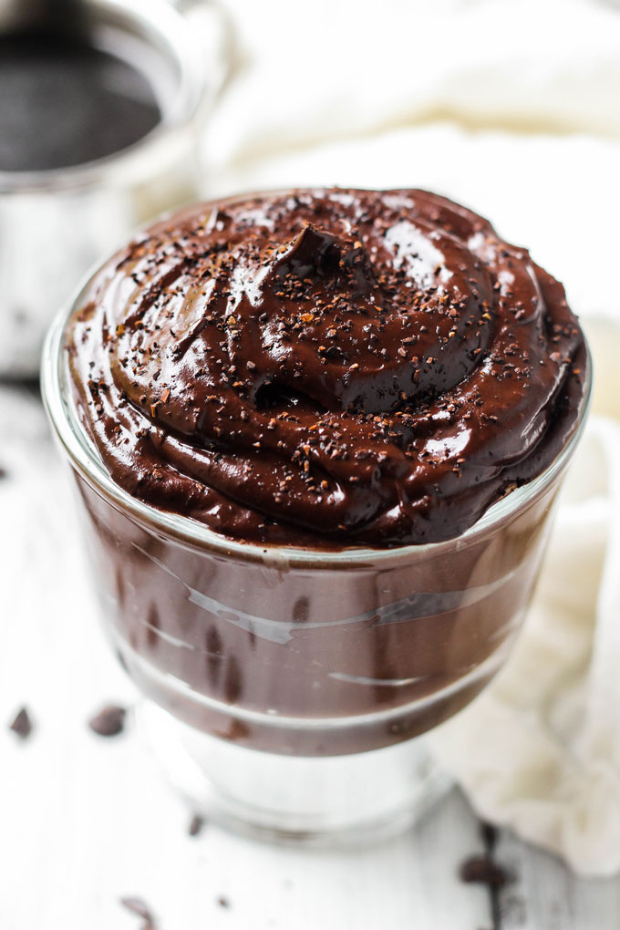 a cup of vegan avocado chocolate pudding