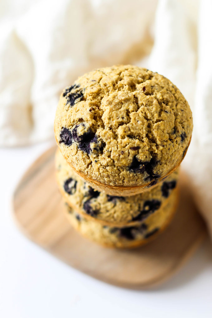 an overhead shot of a blueberry cornmeal muffin